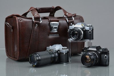 Lot 419 - Three Olympus OM SLR Cameras
