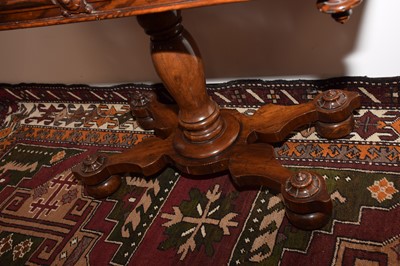 Lot 28 - A Victorian walnut and ebony inlaid card table