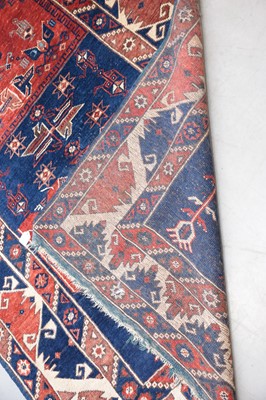 Lot 57 - A vintage Middle Eastern woollen mihrab prayer carpet