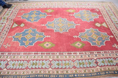 Lot 61 - A large Middle Eastern woollen carpet