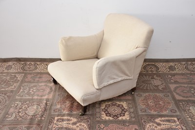 Lot 94 - A Victorian and later upholstered armchair from Howard & Sons
