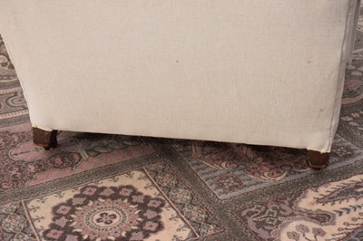 Lot 94 - A Victorian and later upholstered armchair from Howard & Sons