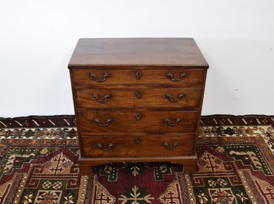 Lot 122 - A George III small mahogany tea caddy chest of drawers