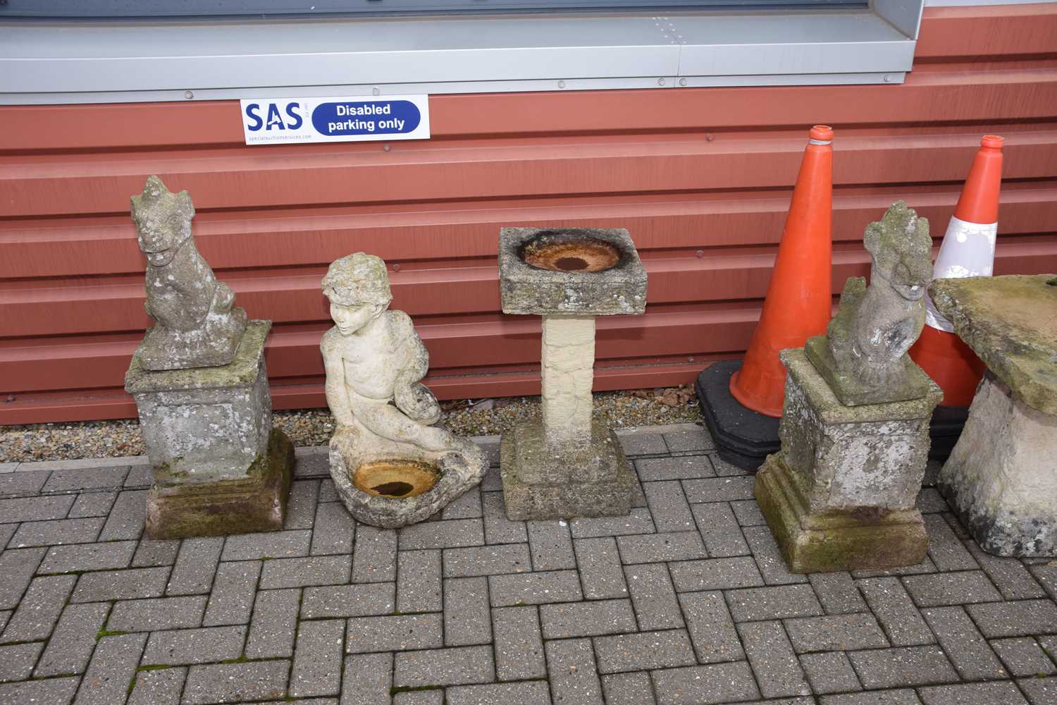 Lot 133 - Four concrete garden ornaments