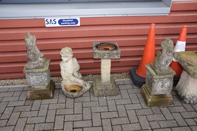 Lot 133 - Four concrete garden ornaments