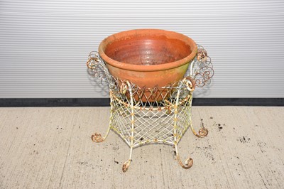 Lot 141 - A second half 20th century white painted metal mesh garden plant pot support