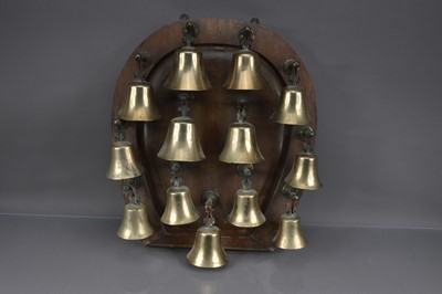 Lot 230 - A set of 13 Victorian bronze hand bells