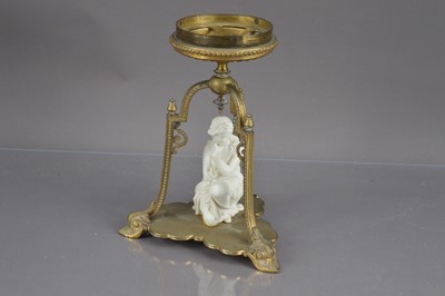 Lot 234 - An interesting Mappin Brothers gilt stand with a Parian ware figure of a maiden
