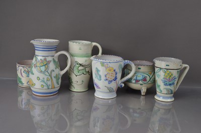Lot 346 - Six vintage Honiton and other terracotta and floral decorated jugs and vases