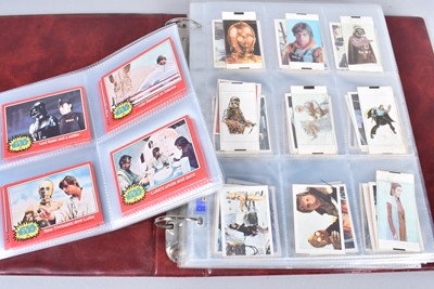 Lot 261 - Star Wars Bubble Gum Cards By Topps and Empire Strikes Back Stickers by FKS