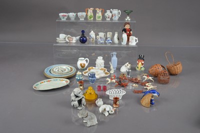 Lot 391 - A frosted glass French bulldog with rhinestone eyes
