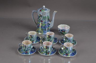 Lot 411 - An Art Deco 'Wilton Ware' lustre coffee set by A G Harley-Jones of Stoke-on-Trent.
