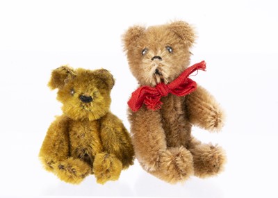 Lot 136 - Two post-war miniature Schuco panda teddy bears