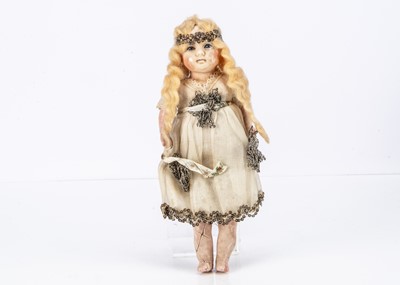 Lot 189 - An early 20th Century German wax over composition shoulder head fairy doll