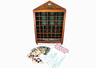 Lot 364 - A Hantel wooden wall mounted display cabinet