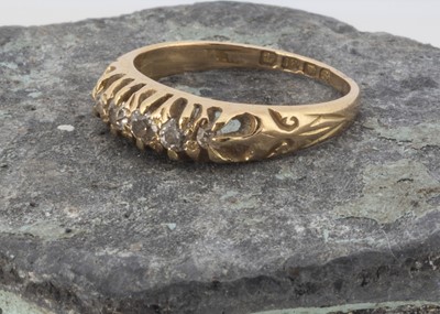 Lot 60 - A George V 9ct gold five stone diamond ring
