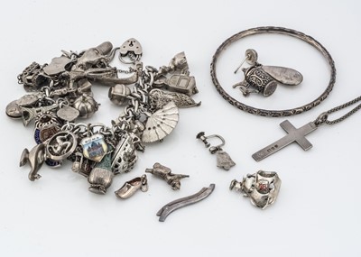 Lot 106 - A silver charm braclet