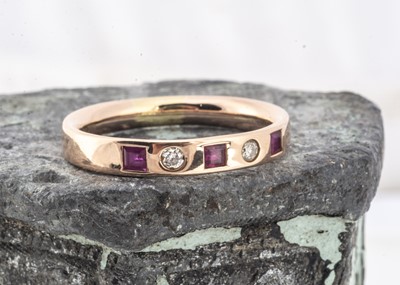 Lot 127 - A contemporary five stone ruby and diamond 18ct ring