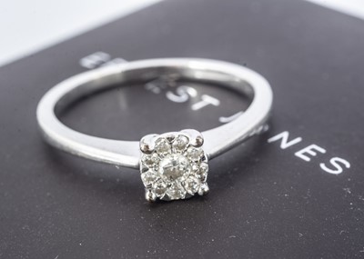 Lot 217 - A 9ct gold gold diamond set dress ring