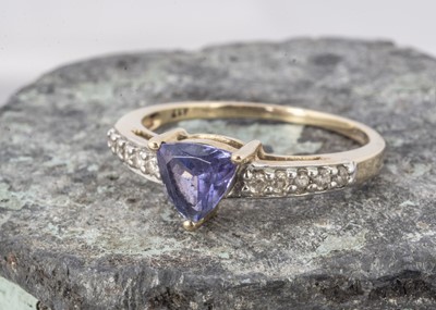 Lot 235 - A 9ct gold tanzanite and white zircon dress ring
