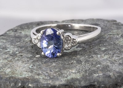 Lot 236 - A 9ct white gold tanzanite and zircon dress ring