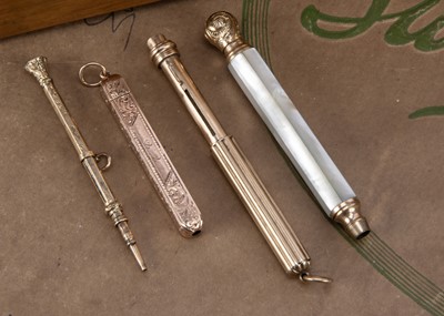 Lot 249 - Three small Victorian and later gold pencils and a gold plated example