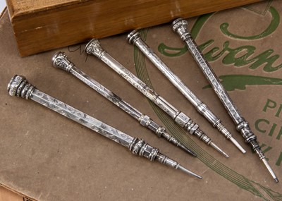 Lot 250 - Five Victorian silver and white metal retractable pencils