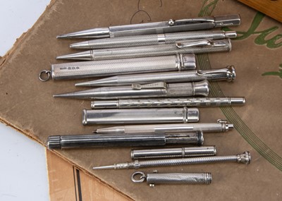 Lot 251 - A group of eleven silver and silver plated pencils and related items