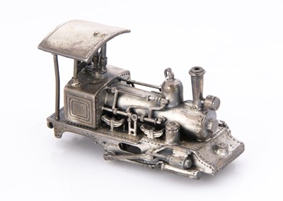 Lot 303 - A modern silver model of a train