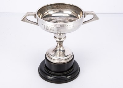 Lot 330 - A George V silver presentation twin-handled trophy with weighted base