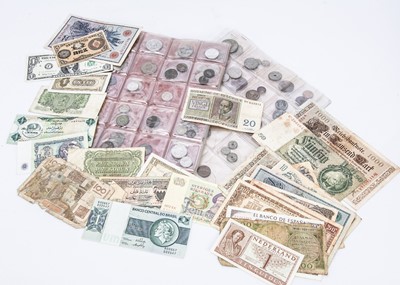 Lot 125 - An Album containing a good selection of world coinage