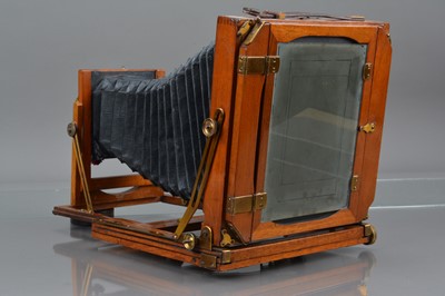 Lot 28 - A Mahogany and Brass Half Plate Camera