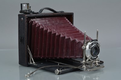Lot 67 - A Koilos 6¾''x5'' Folding Bed Camera