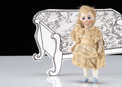 Lot 18 - A French all-bisque swivel head dolls’ house doll