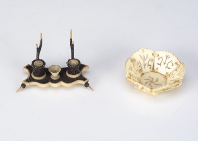 Lot 21 - A rare mid 19th century dolls’ house bone ‘antler’ inkwell