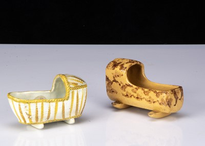 Lot 23 - A pearlware Pratt-type dolls’ house cradle, circa 1800