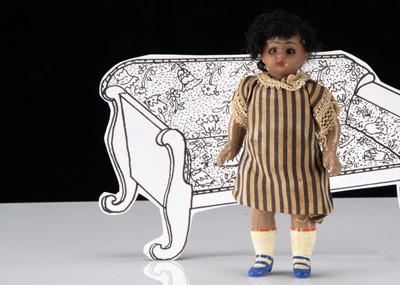 Lot 39 - A Simon & Halbig black swivel head dolls’ house doll