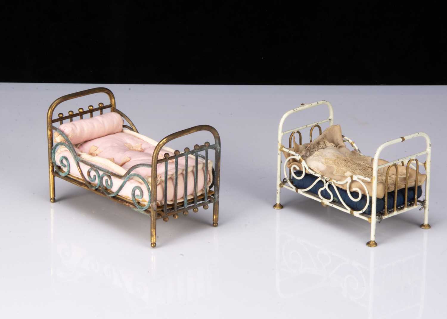 Lot 49 - Two German dolls’ house beds