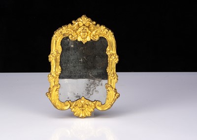 Lot 60 - A large German gilt metal dolls' house mirror