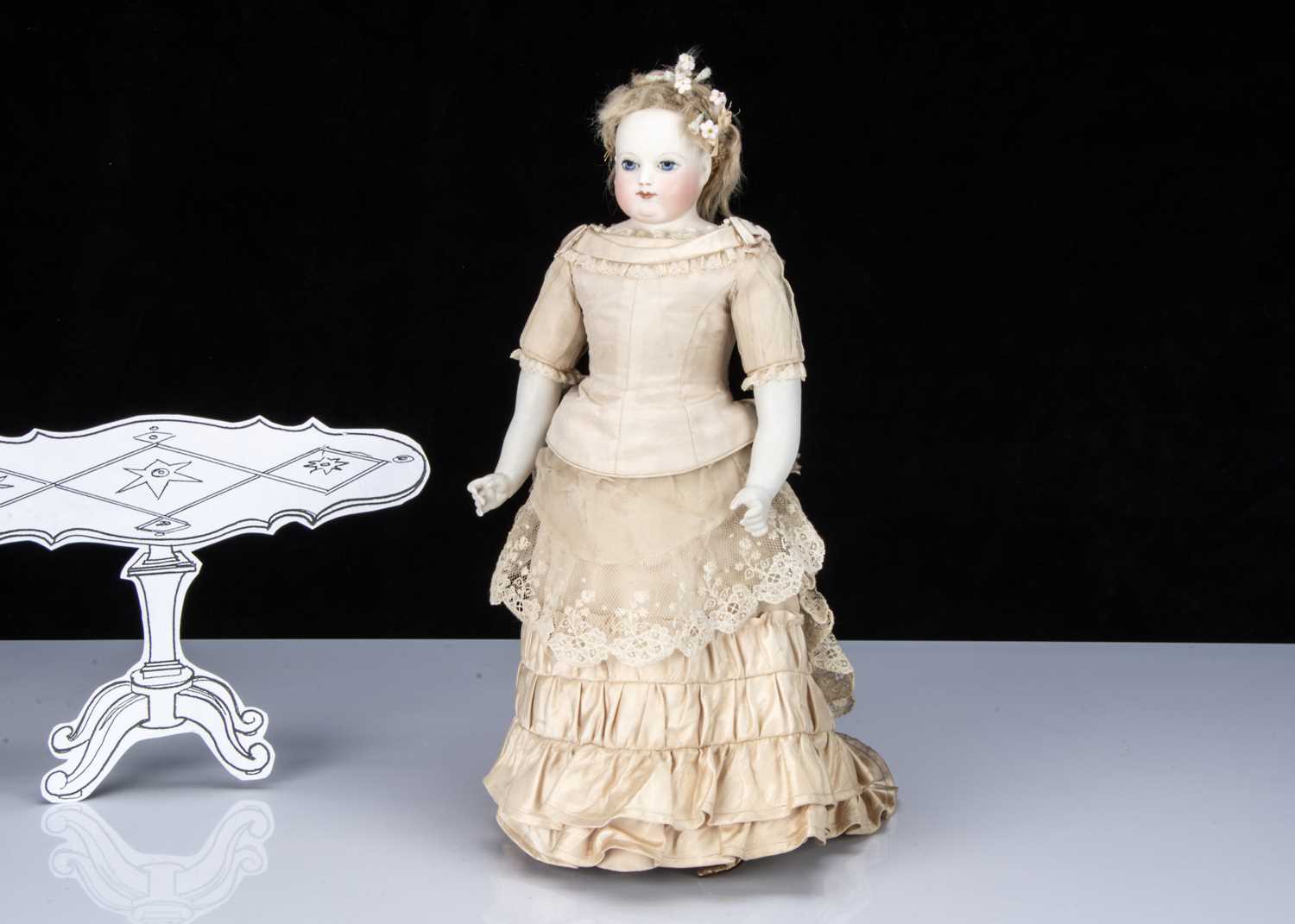 Lot 120 - A French fixed shoulder-head fashionable doll with painted eyes