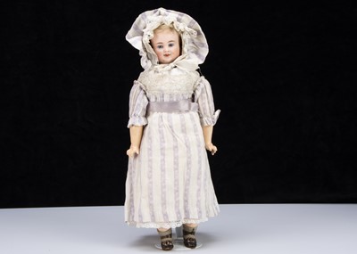 Lot 149 - A rare Bergner three faced bisque headed doll
