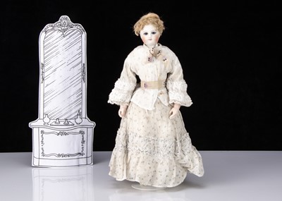 Lot 228 - A French bisque swivel head fashionable doll