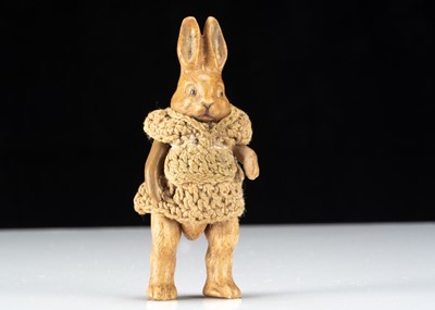 Lot 306 - A Hertwig all-bisque dolls’ house rabbit girl doll
