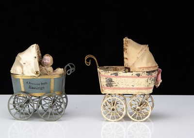 Lot 337 - Two tinplate dolls or larger dolls’ house perambulators
