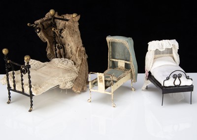 Lot 338 - Three dolls’ house beds