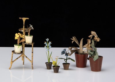 Lot 340 - Three Viennese cold painted bronze dolls’ house flowers in pots