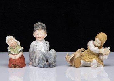 Lot 397 - A Vienna porcelain seated girl defending a piece of bread from a chicken