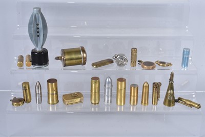 Lot 302 - A collection of Trench Art and brass table lighters