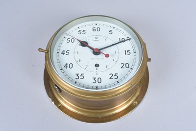 Lot 447 - A WWII Period Naval brass bulkhead clock