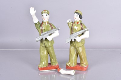 Lot 575 - Two Red Army pottery figures